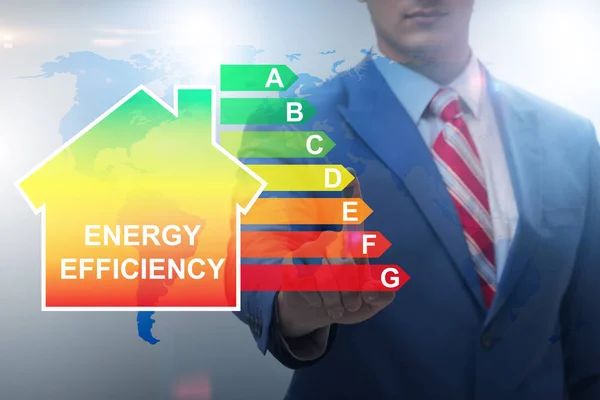 Üzletember az energiahatékonyság koncepciójában — Stock Fotó