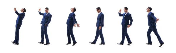 Бізнесмен, що йде стоячи збоку, ізольований на білому фоні — стокове фото