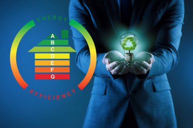 Enerji verimliliği kavramında iş adamı