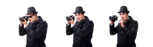 Spy with camera taking pictures isolated on white — Stock Photo, Image