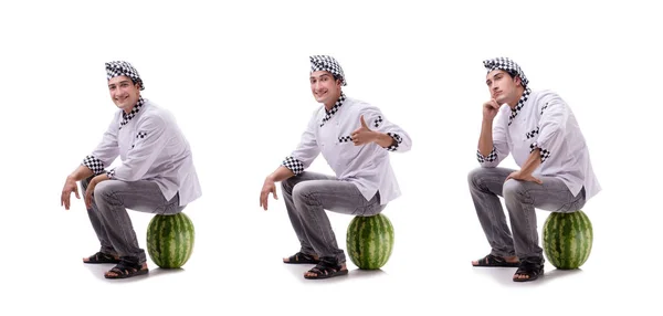 Fiatal férfi szakács görögdinnye elszigetelt fehér — Stock Fotó