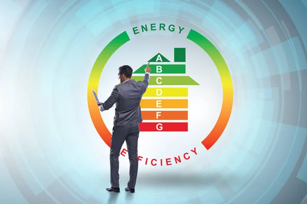 Zakenman in het concept energie-efficiëntie — Stockfoto