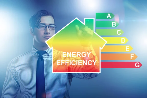 Zakenman in het concept energie-efficiëntie — Stockfoto