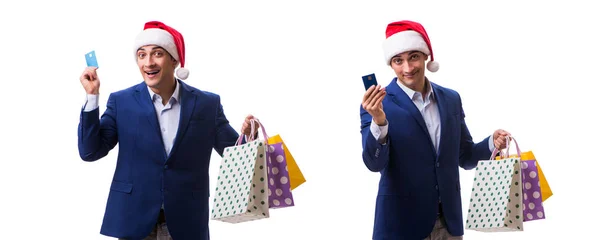 白色背景的圣诞购物后提着购物袋的年轻人 — 图库照片