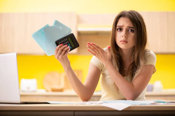 Young woman wife in budget planning concept — Stock Photo, Image