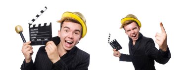 Elinde film tahtası olan komik bir adam.