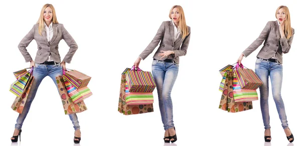 Schöne Frau mit Einkaufstaschen isoliert auf weiß — Stockfoto