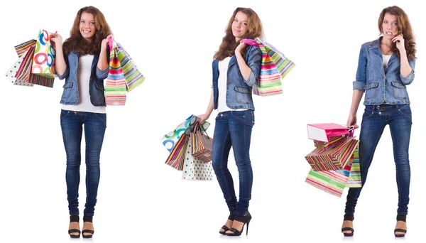 Giovane donna con borse della spesa isolate su bianco — Foto Stock