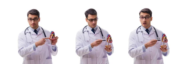 Young doctor with heart shape isolated on white — Stock Photo, Image