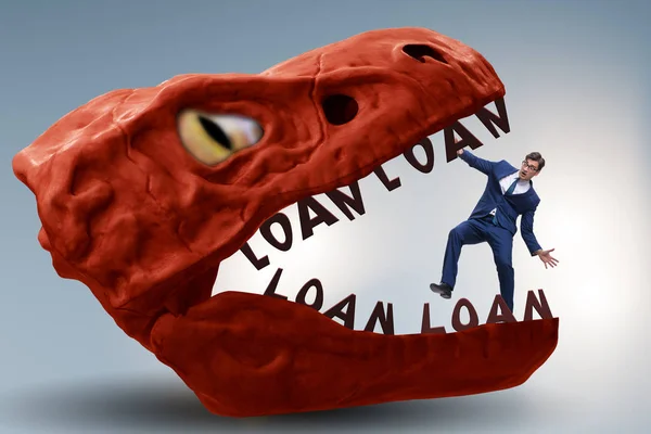 Empresario en las mandíbulas de la deuda y el préstamo — Foto de Stock