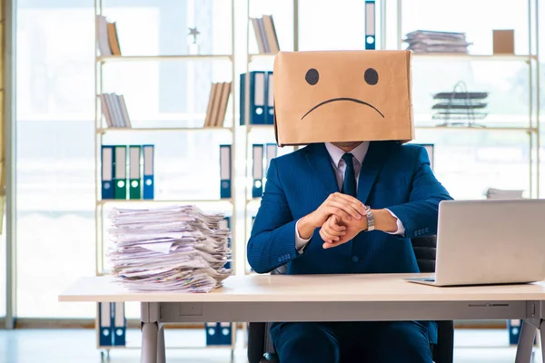 Unhappy man with box instead of his head — Stock Photo, Image