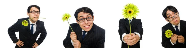 Jovem de traje preto com flor isolada em branco — Fotografia de Stock