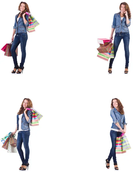 Young woman with shopping bags isolated on white — Stock Photo, Image