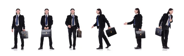 Young businessman holding briefcase isolated on white — Stock Photo, Image