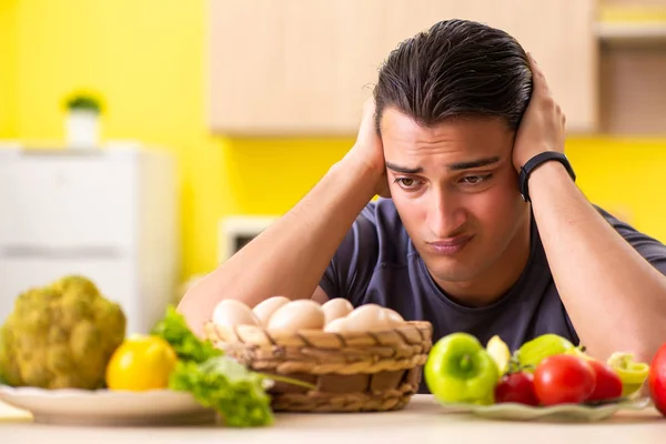 Young man in dieting and healthy eating concept — Stock Photo, Image