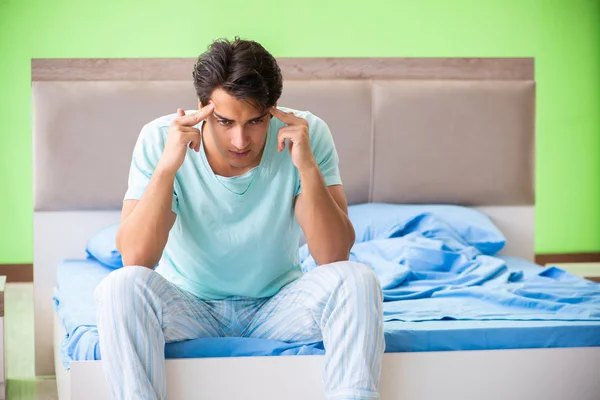 Man suffering from sleeping disorder and insomnia — Stock Photo, Image