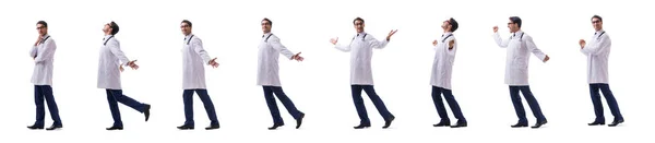 Médico joven de pie caminando aislado en blanco backgr —  Fotos de Stock