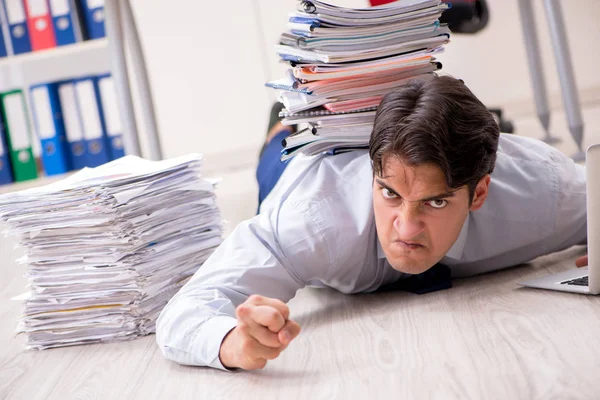 Extremely busy employee working in the office — Stock Photo, Image