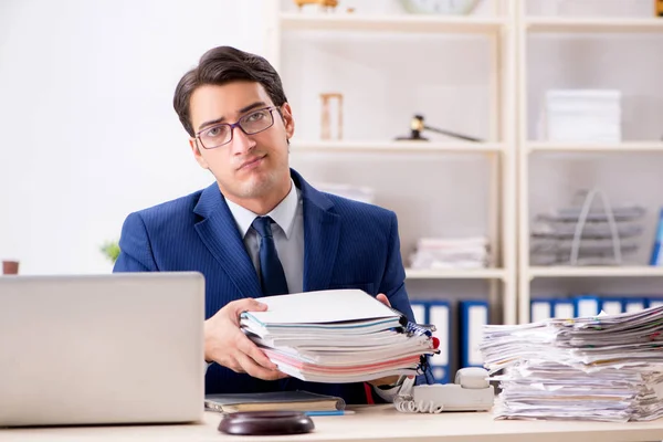 Busy man complaining about his workload