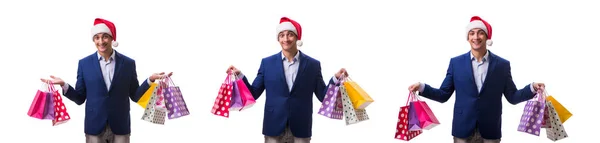Anak muda dengan tas setelah natal berbelanja di latar belakang putih — Stok Foto