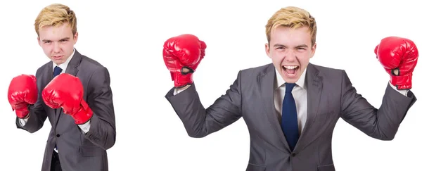 Empleado joven con guantes de boxeo aislados en blanco —  Fotos de Stock