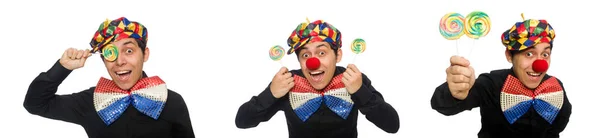 Grappige clown met lollipop geïsoleerd op wit — Stockfoto