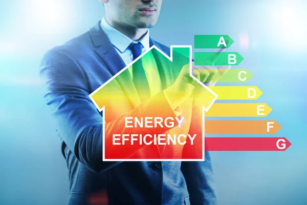 Empresario en concepto de eficiencia energética — Foto de Stock