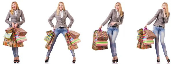 Mulher bonita com sacos de compras isolados em branco — Fotografia de Stock