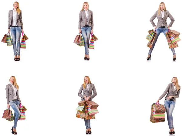 Mulher bonita com sacos de compras isolados em branco — Fotografia de Stock