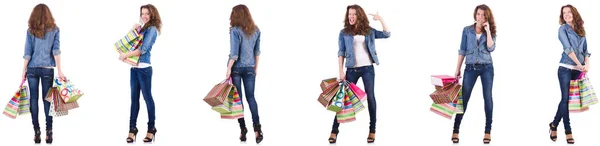 Young woman with shopping bags isolated on white — Stock Photo, Image