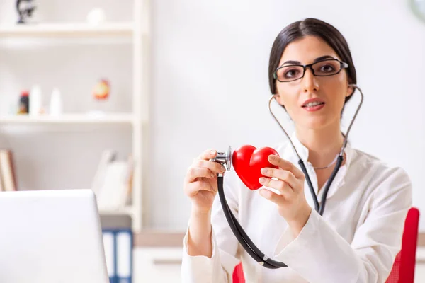 Young doctor in heart care concept — Stock Photo, Image