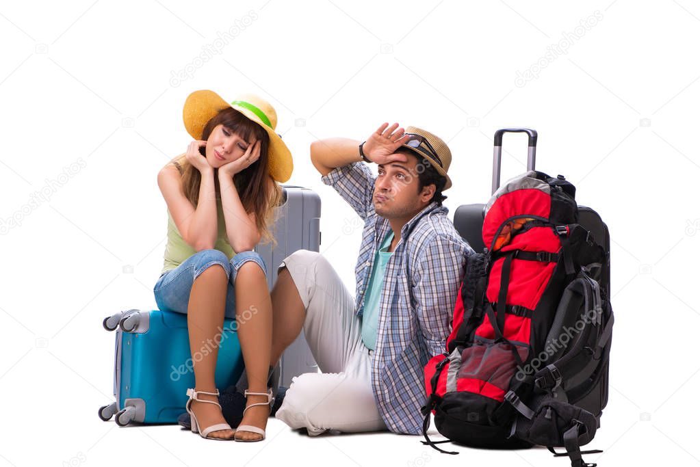 Young family preparing for vacation travel on white