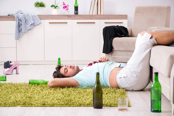 Young drunk handsome man after party at home — Stock Photo, Image