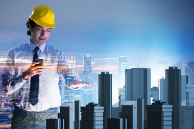 Gelecekçi mimar şehir planlaması yapıyor.