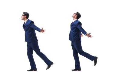 İşadamı yürüme ayakta yan görüntülemek izole üzerinde beyaz backgro