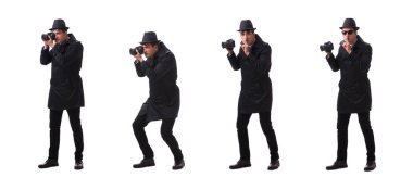 Kameralı casus beyaza izole edilmiş fotoğraflar çekiyor.