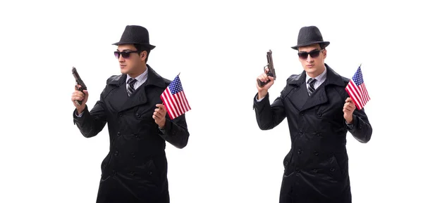 Homme espion avec arme de poing et drapeau américain isolé sur fond blanc — Photo