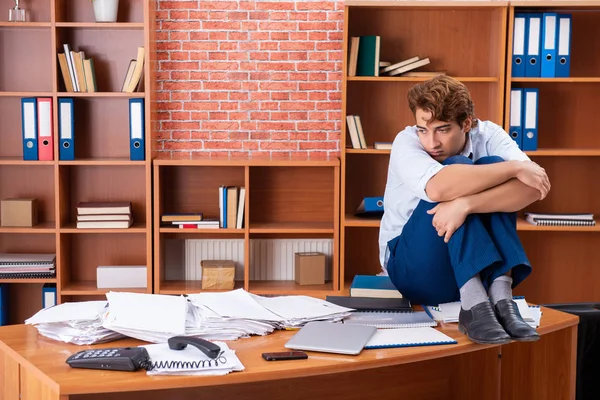 Unhappy businessman sitting in the office — Stock Photo, Image