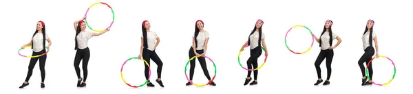 A girl in sport suit with hula hoop isolated on white — Stock Photo, Image