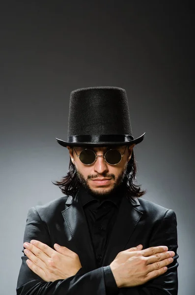 Vintage concept with man wearing black top hat — Stock Photo, Image