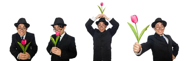 Jovem de traje preto com flor isolada em branco — Fotografia de Stock