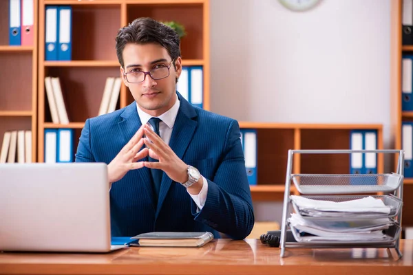 Young handsome businessman working in the office — Stock Photo, Image