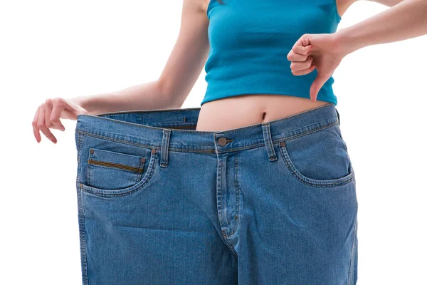 Concept of dieting with oversized jeans — Stock Photo, Image