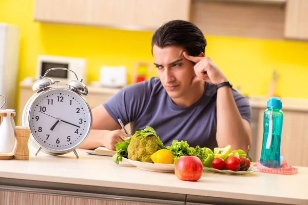 Young man in dieting and healthy eating concept — Stock Photo, Image