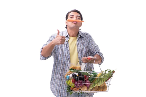 Joven con su tienda de comestibles en blanco —  Fotos de Stock