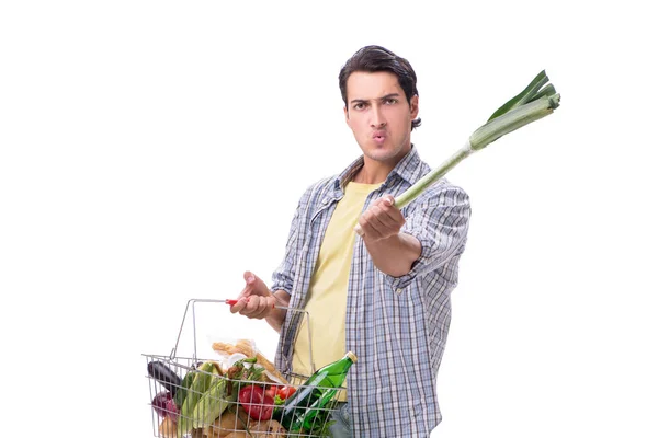 Joven con su tienda de comestibles en blanco — Foto de Stock