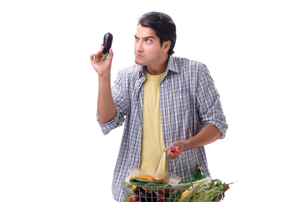 Joven con su tienda de comestibles en blanco — Foto de Stock