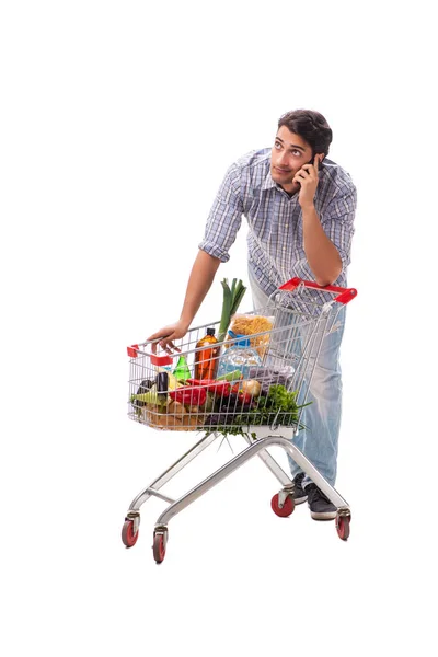 Jonge man met supermarkt kar trolley op wit — Stockfoto