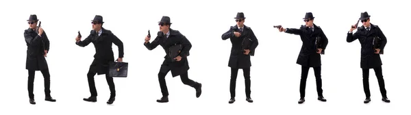 Чоловік шпигун з пістолетом ізольований на білому тлі — стокове фото