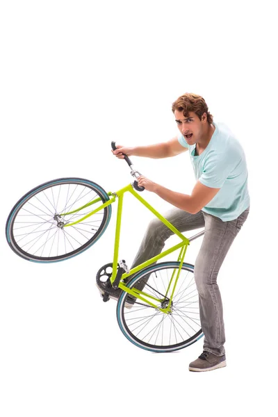 Jovem montando uma bicicleta isolada no fundo branco — Fotografia de Stock